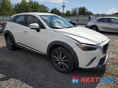 Czwarte zdjęcie samochodu z boku: 2017 MAZDA CX-3 GRAND TOURING VIN:JM1DKFD74H0149044 - miniatura