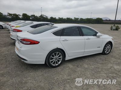 Trzecie zdjęcie samochodu z tyłu: 2017 FORD FUSION SE HYBRID VIN:3FA6P0LU8HR409188 - miniatura