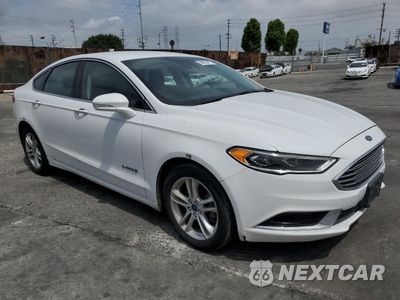 Czwarte zdjęcie samochodu z boku: 2018 FORD FUSION SE HYBRID VIN:3FA6P0LUXJR278643 - miniatura