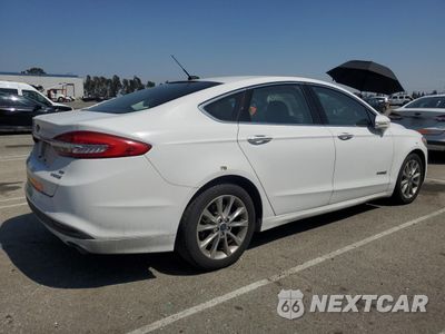 Trzecie zdjęcie samochodu z tyłu: 2017 FORD FUSION SE HYBRID VIN:3FA6P0LU6HR409738 - miniatura