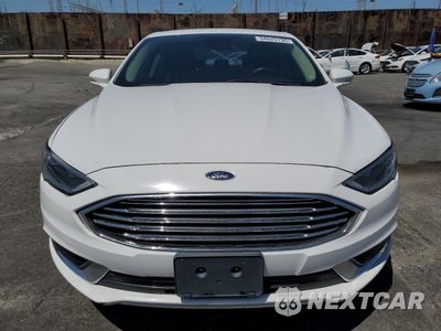 Piąte zdjęcie samochodu w środku: 2018 FORD FUSION SE HYBRID VIN:3FA6P0LU0JR118674 - miniatura