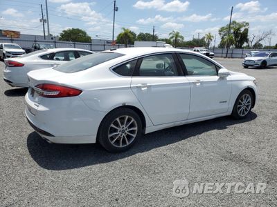 Trzecie zdjęcie samochodu z tyłu: 2017 FORD FUSION SE HYBRID VIN:3FA6P0LU0HR359547 - miniatura