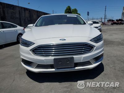 Piąte zdjęcie samochodu w środku: 2018 FORD FUSION SE HYBRID VIN:3FA6P0LU7JR172134 - miniatura
