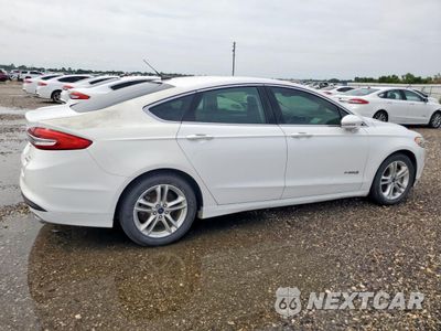 Trzecie zdjęcie samochodu z tyłu: 2018 FORD FUSION SE HYBRID VIN:3FA6P0LU1JR129814 - miniatura