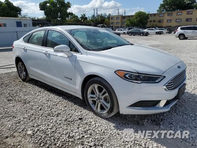 Czwarte zdjęcie samochodu z boku: 2018 FORD FUSION SE HYBRID VIN:3FA6P0LU4JR172026 - miniatura