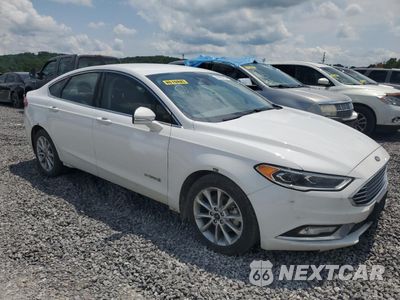 Czwarte zdjęcie samochodu z boku: 2017 FORD FUSION SE HYBRID VIN:3FA6P0LU9HR409457 - miniatura