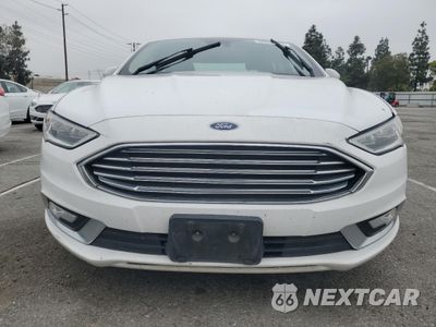 Piąte zdjęcie samochodu w środku: 2017 FORD FUSION SE HYBRID VIN:3FA6P0LU4HR409754 - miniatura