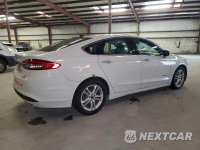 Trzecie zdjęcie samochodu z tyłu: 2018 FORD FUSION SE HYBRID VIN:3FA6P0LU6JR171797 - miniatura