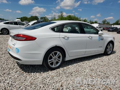 Trzecie zdjęcie samochodu z tyłu: 2018 FORD FUSION SE HYBRID VIN:3FA6P0LU6JR118713 - miniatura