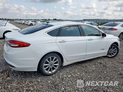 Trzecie zdjęcie samochodu z tyłu: 2017 FORD FUSION SE HYBRID VIN:3FA6P0LU4HR409009 - miniatura