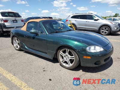 Czwarte zdjęcie samochodu z boku: 2004 MAZDA MX-5 MIATA BASE VIN:JM1NB353040400697 - miniatura