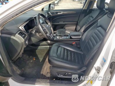 Zdjęcie 7 z 13 samochodu: 2018 FORD FUSION SE HYBRID VIN:3FA6P0LU5JR118783 - miniatura
