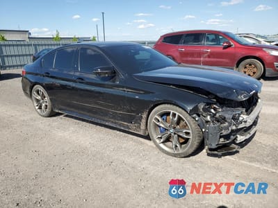 Czwarte zdjęcie samochodu z boku: 2019 BMW M550XI VIN:WBAJB9C58KB288882 - miniatura