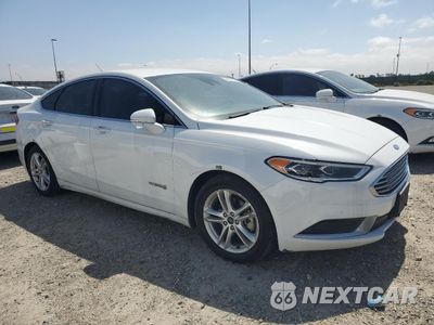 Czwarte zdjęcie samochodu z boku: 2018 FORD FUSION SE HYBRID VIN:3FA6P0LU7JR118672 - miniatura