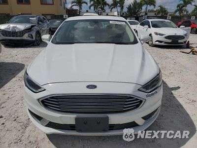 Piąte zdjęcie samochodu w środku: 2018 FORD FUSION SE HYBRID VIN:3FA6P0LU3JR118605 - miniatura