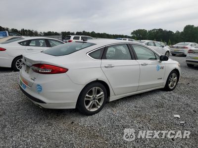 Trzecie zdjęcie samochodu z tyłu: 2018 FORD FUSION SE HYBRID VIN:3FA6P0LUXJR129908 - miniatura