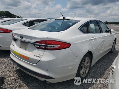 Trzecie zdjęcie samochodu z tyłu: 2018 FORD FUSION SE HYBRID VIN:3FA6P0LU6JR171962 - miniatura