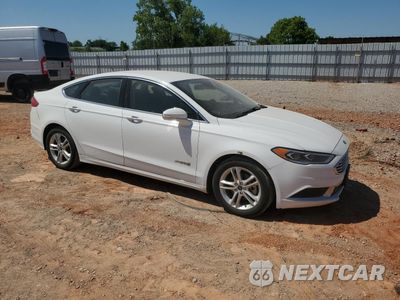 Czwarte zdjęcie samochodu z boku: 2018 FORD FUSION SE HYBRID VIN:3FA6P0LU0JR171830 - miniatura