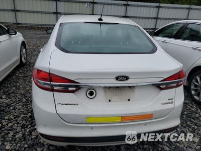 Zdjęcie 6 z 12 samochodu: 2017 FORD FUSION SE HYBRID VIN:3FA6P0LU6HR409271 - miniatura