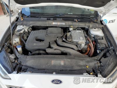 Zdjęcie 11 z 12 samochodu: 2017 FORD FUSION SE HYBRID VIN:3FA6P0LU5HR410105 - miniatura
