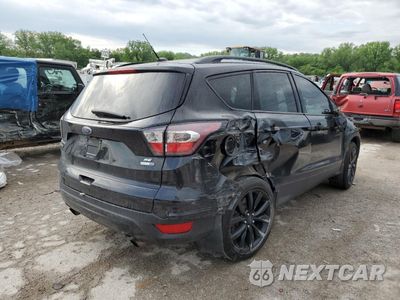 Trzecie zdjęcie samochodu z tyłu: 2017 FORD ESCAPE SE VIN:1FMCU9GD4HUC25553 - miniatura