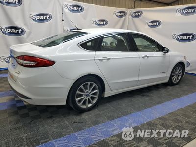 Trzecie zdjęcie samochodu z tyłu: 2017 FORD FUSION SE HYBRID VIN:3FA6P0LU8HR409501 - miniatura