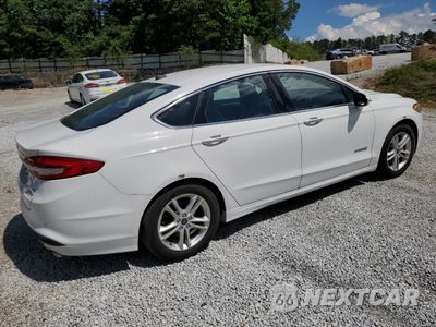 Trzecie zdjęcie samochodu z tyłu: 2018 FORD FUSION SE HYBRID VIN:3FA6P0LU8JR281914 - miniatura