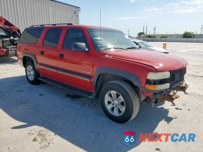 Czwarte zdjęcie samochodu z boku: 2000 CHEVROLET SUBURBAN C1500 VIN:3GNEC16T9YG170067 - miniatura