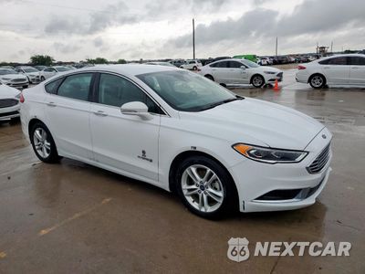 Czwarte zdjęcie samochodu z boku: 2018 FORD FUSION SE HYBRID VIN:3FA6P0LU9JR171938 - miniatura
