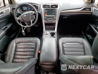 Zdjęcie 8 z 12 samochodu: 2018 FORD FUSION SE HYBRID VIN:3FA6P0LU9JR171650 - miniatura