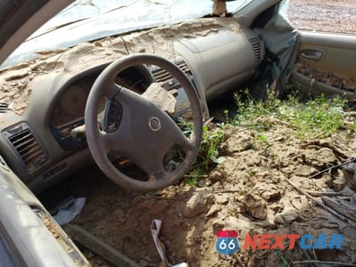 Zdjęcie 8 z 13 samochodu: 2003 NISSAN MAXIMA GLE VIN:JN1DA31A23T418511 - miniatura