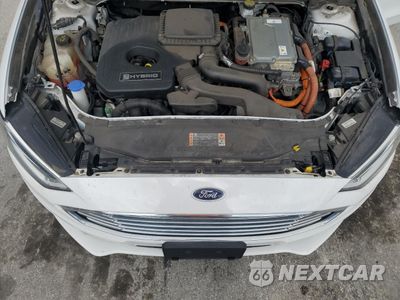 Zdjęcie 11 z 12 samochodu: 2018 FORD FUSION SE HYBRID VIN:3FA6P0LU9JR171731 - miniatura