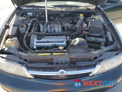 Zdjęcie 11 z 12 samochodu: 1999 NISSAN MAXIMA GLE VIN:JN1CA21D3XT809866 - miniatura