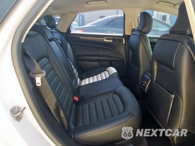 Zdjęcie 10 z 13 samochodu: 2018 FORD FUSION SE HYBRID VIN:3FA6P0LU4JR198321 - miniatura