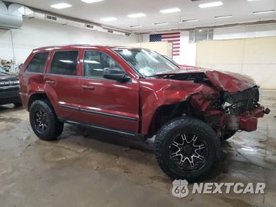 Czwarte zdjęcie samochodu z boku: 2007 JEEP GRAND CHEROKEE LAREDO VIN:1J8GR48K57C660991 - miniatura