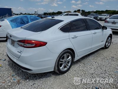 Trzecie zdjęcie samochodu z tyłu: 2018 FORD FUSION SE HYBRID VIN:3FA6P0LU0JR278750 - miniatura