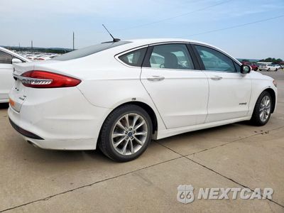 Trzecie zdjęcie samochodu z tyłu: 2017 FORD FUSION SE HYBRID VIN:3FA6P0LU0HR409721 - miniatura