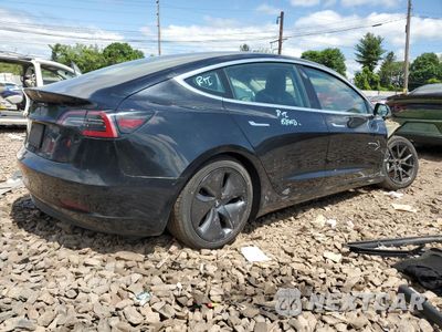 Trzecie zdjęcie samochodu z tyłu: 2019 TESLA MODEL 3 VIN:5YJ3E1EB6KF384465 - miniatura