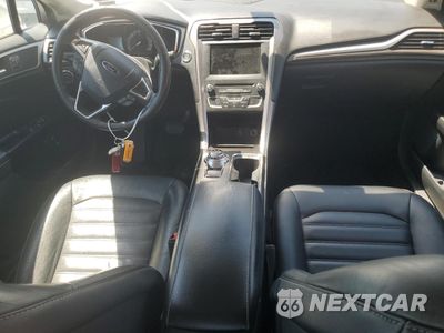 Zdjęcie 8 z 12 samochodu: 2017 FORD FUSION SE HYBRID VIN:3FA6P0LU3HR409292 - miniatura