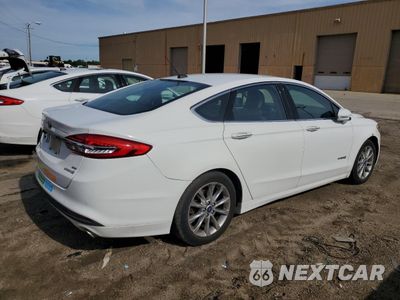 Trzecie zdjęcie samochodu z tyłu: 2017 FORD FUSION SE HYBRID VIN:3FA6P0LU8HR359618 - miniatura