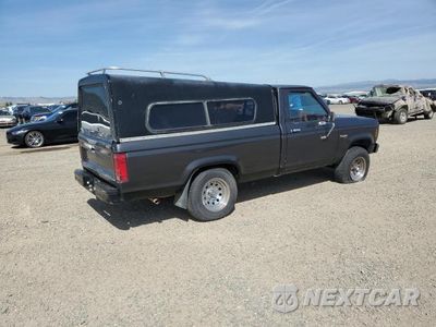 Trzecie zdjęcie samochodu z tyłu: 1984 FORD RANGER VIN:1FTCR1153EVC63673 - miniatura