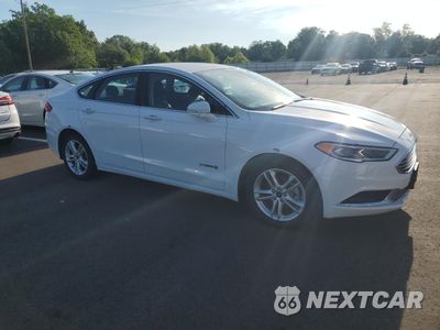 Czwarte zdjęcie samochodu z boku: 2018 FORD FUSION SE HYBRID VIN:3FA6P0LU2JR281911 - miniatura