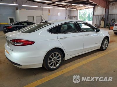 Trzecie zdjęcie samochodu z tyłu: 2017 FORD FUSION SE HYBRID VIN:3FA6P0LU1HR359640 - miniatura