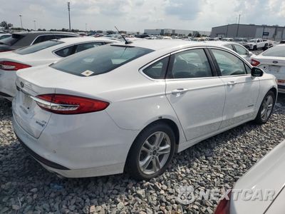 Trzecie zdjęcie samochodu z tyłu: 2018 FORD FUSION SE HYBRID VIN:3FA6P0LU7JR129896 - miniatura