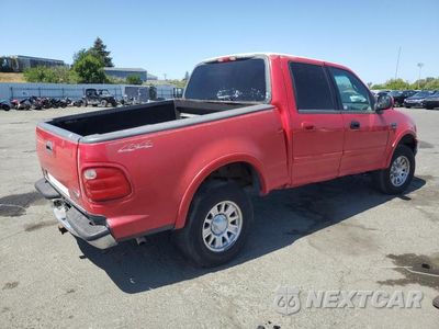 Trzecie zdjęcie samochodu z tyłu: 2001 FORD F150 SUPERCREW VIN:1FTRW08L91KF46743 - miniatura
