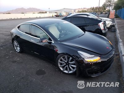 Czwarte zdjęcie samochodu z boku: 2019 TESLA MODEL 3 VIN:5YJ3E1EA7KF429453 - miniatura