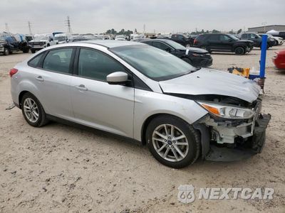 Czwarte zdjęcie samochodu z boku: 2018 FORD FOCUS SE VIN:1FADP3F20JL207047 - miniatura