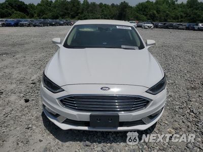 Piąte zdjęcie samochodu w środku: 2017 FORD FUSION SE HYBRID VIN:3FA6P0LU6HR409660 - miniatura