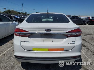 Zdjęcie 6 z 13 samochodu: 2017 FORD FUSION SE HYBRID VIN:3FA6P0LU9HR409328 - miniatura