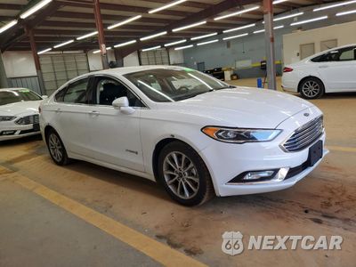 Czwarte zdjęcie samochodu z boku: 2017 FORD FUSION SE HYBRID VIN:3FA6P0LU5HR410038 - miniatura